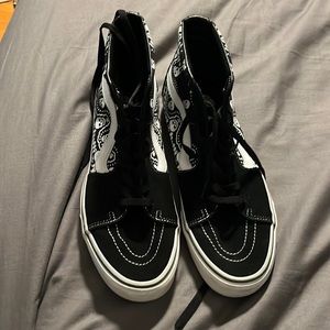 Black and white skull vans